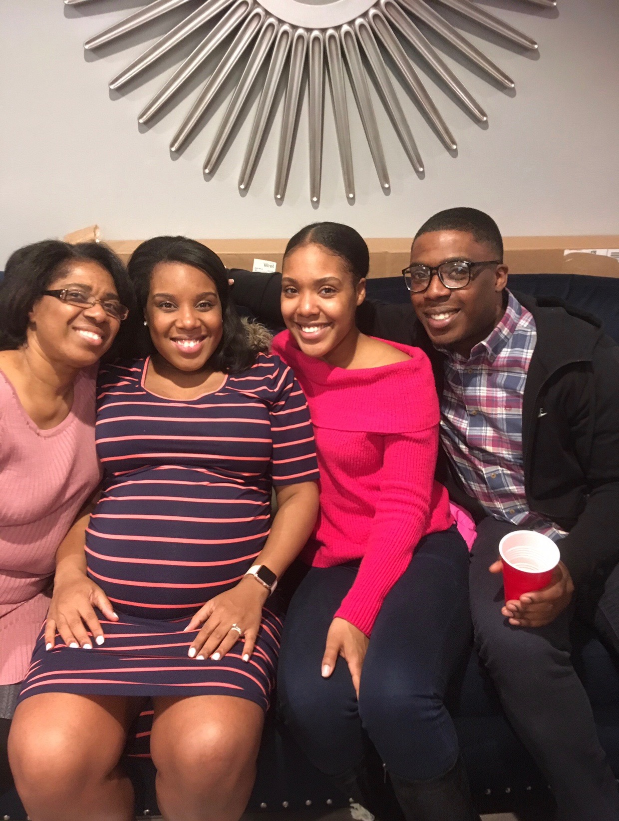 Author Naomi Fedna poses with her sister, brother-in-law, and mother.