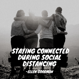 Four friends with their arms around each other's backs