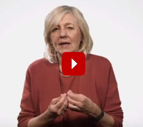 Ellen Goodman mid-talking
