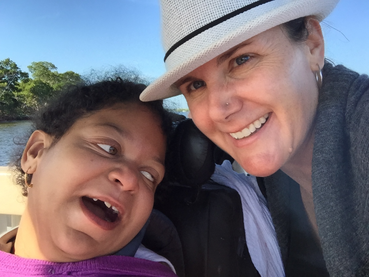 Cara Coleman smiling with her daughter